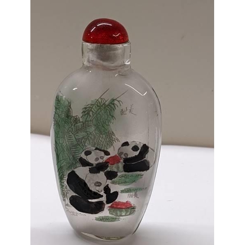 150 - A Chinese perfume bottle hand painted with pandas and another Chinese perfume bottle.