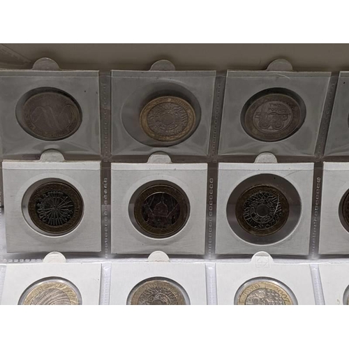 155 - A collection of 77 £2 coins including rare examples.