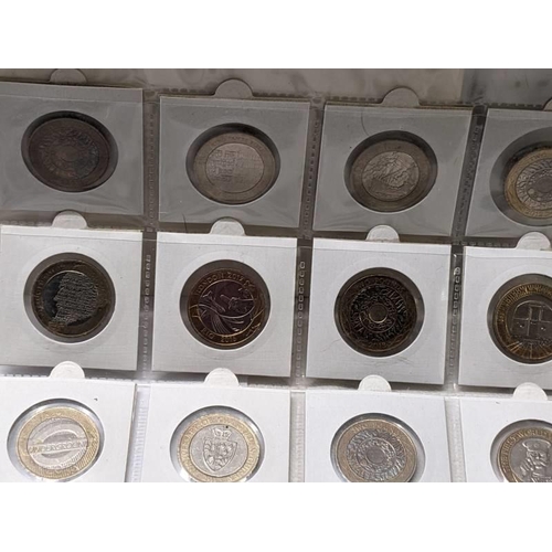 155 - A collection of 77 £2 coins including rare examples.