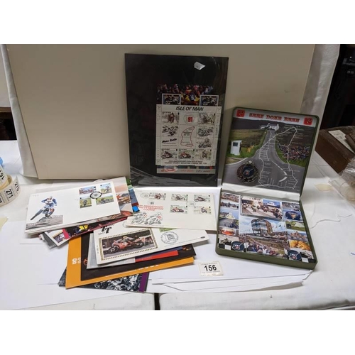 156 - An interesting collection of Isle of Man TT race stamps, ephemera, £5 coin, coin covers, signed cove... 