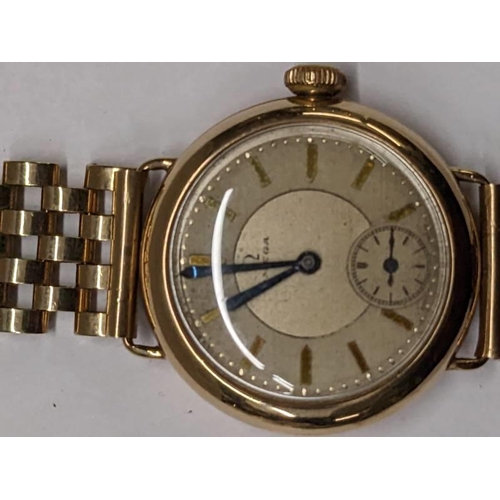 162 - A 9ct gold Omega wrist watch on a 9ct gold bracelet, in working order, total weight 49.4 grams.