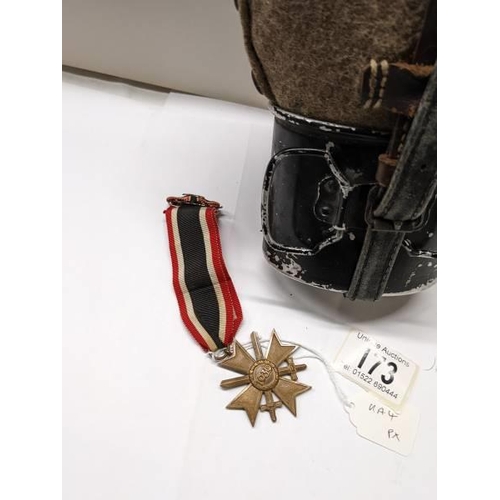 173 - A german long service medal with ribbon and bar together with a water bottle.