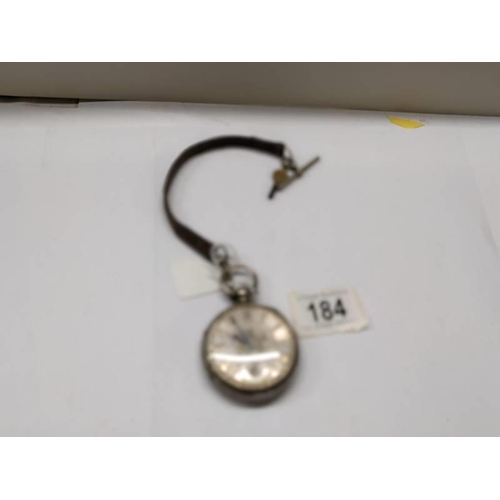 184 - A silver pocket watch with silver dial and Roman numerals.