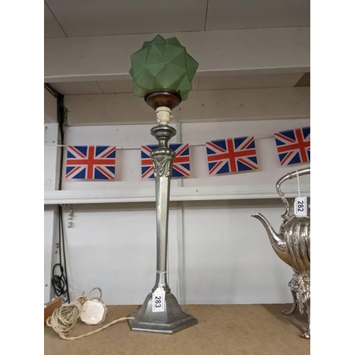 283 - An art deco table lamp with green glass shade.