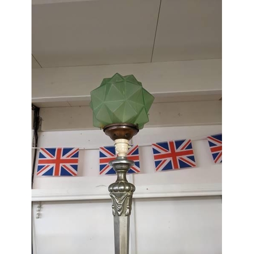 283 - An art deco table lamp with green glass shade.