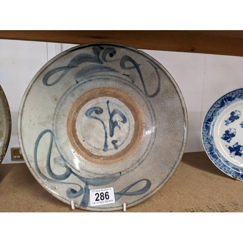 286 - Two 18th century Chinese provincial flat bowls, a/f.