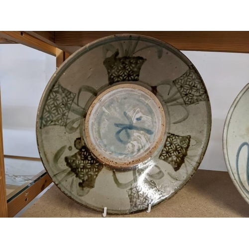 286 - Two 18th century Chinese provincial flat bowls, a/f.