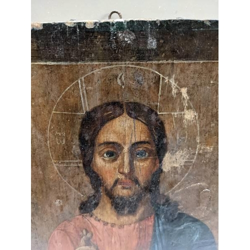 289 - An 18th century Russian icon on board. 31 x 26 cm.