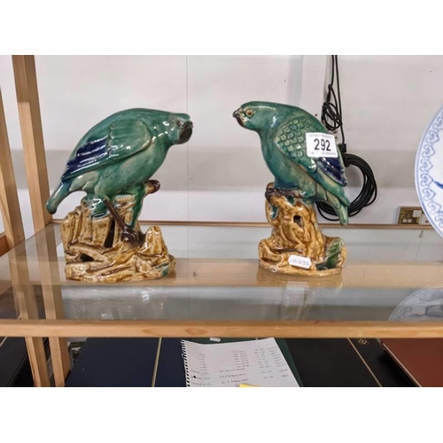 292 - A pair of green ceramic parrots.