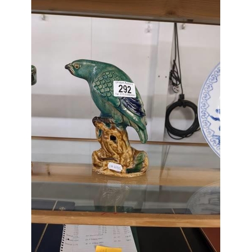 292 - A pair of green ceramic parrots.