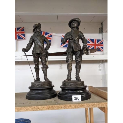 293 - A pair of bronze cavalier figures.