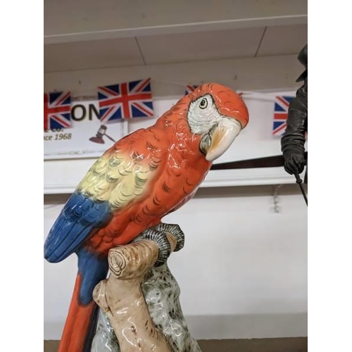 294 - A Royal Dux figure of a macaw.