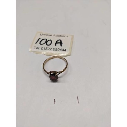 100A - A 9ct gold ring set ruby, size T. 1.9 grams.