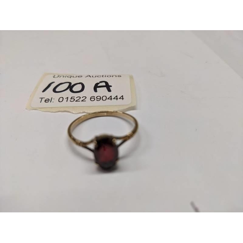 100A - A 9ct gold ring set ruby, size T. 1.9 grams.