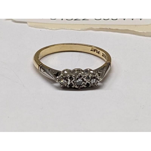 100F - An 18ct gold ring set three good diamonds, size L, 2.4 grams.