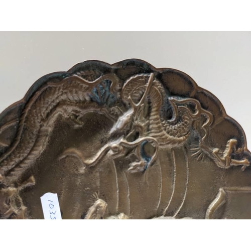 306 - A heavy metal oriental dragon plate.