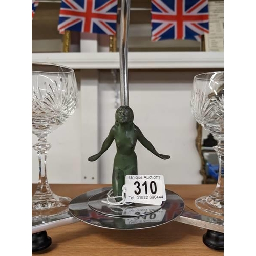 310 - An original chrome art deco table lamp with verdigree spelter kneeling nude with rare street lantern... 