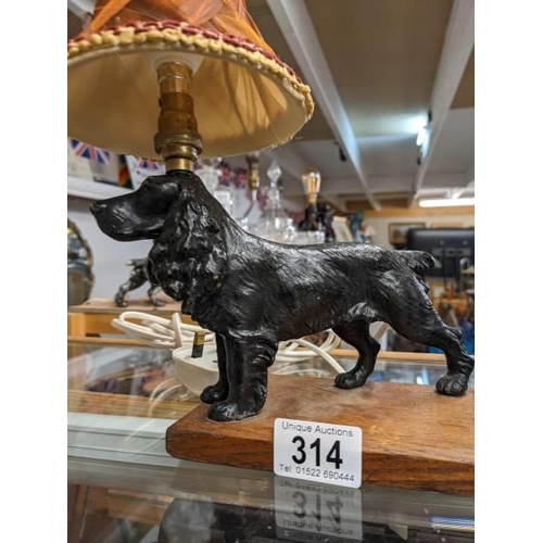 314 - A 1930's spelter standing cocker spaniel table lamp, height to top of shade 28cm, base 15.5 x 19.5 c... 