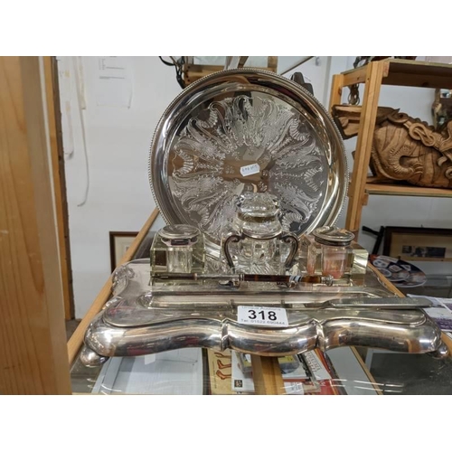 318 - A good quality early 20th century silver plate inkstand, an inkwell, a pen with silver mount and  a ... 