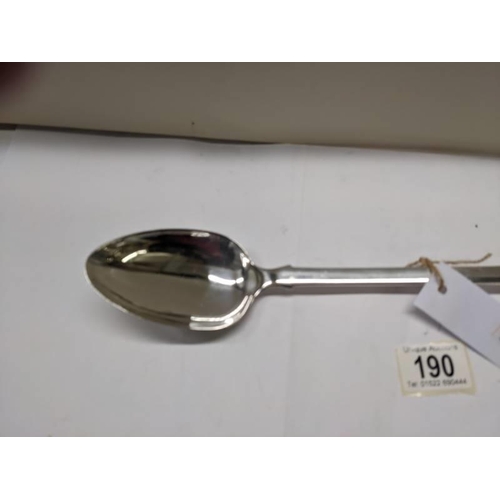 190 - An early 19th century fiddle pattern white metal serving spoons, marks indistinct. 156 grams.