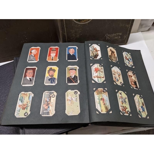 194 - A good selection of cigarette cards in albums.