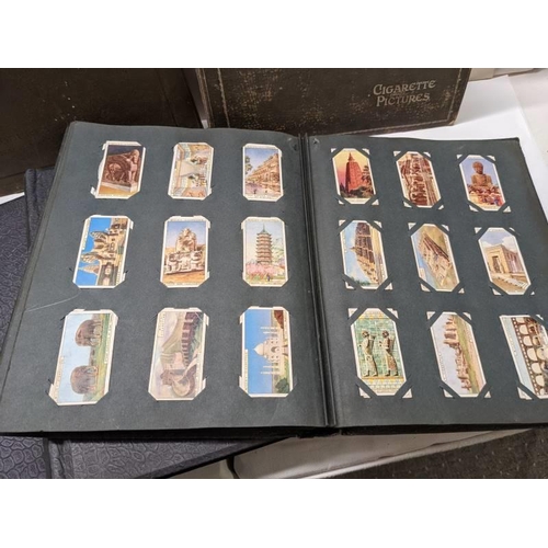 194 - A good selection of cigarette cards in albums.