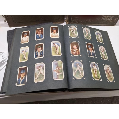 194 - A good selection of cigarette cards in albums.