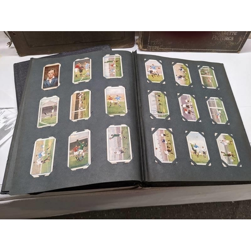 194 - A good selection of cigarette cards in albums.