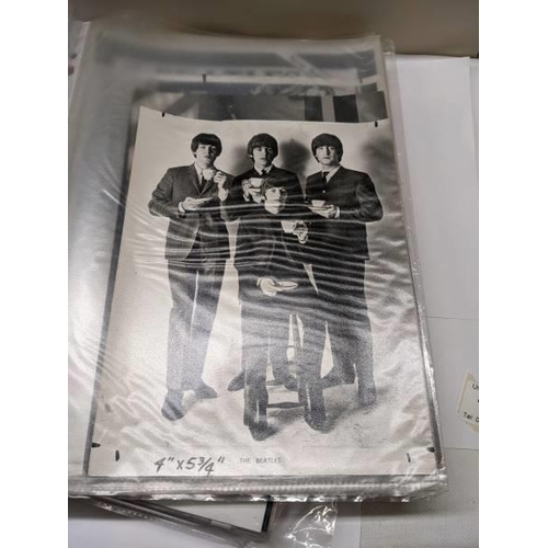 195 - A folder of The Beatles press photos, press releases and newspaper stories.