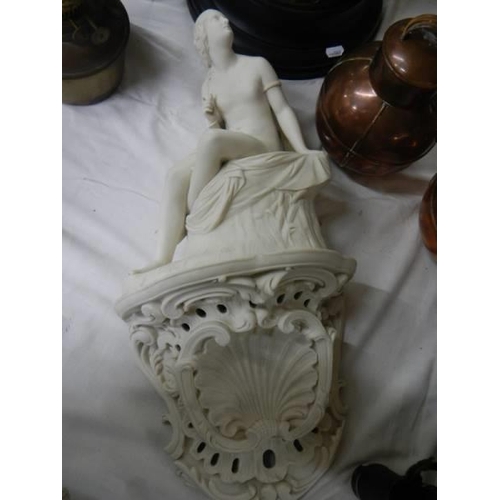 327 - An early Victorian Copeland white porcelain figure complete with wall bracket.