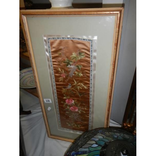 330 - A framed and glazed Chinese silk embroidery.