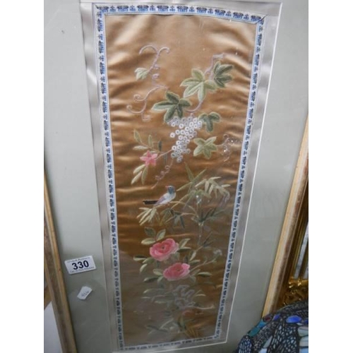 330 - A framed and glazed Chinese silk embroidery.