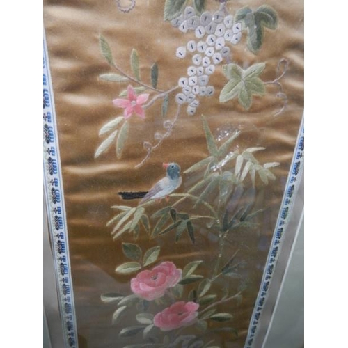 330 - A framed and glazed Chinese silk embroidery.