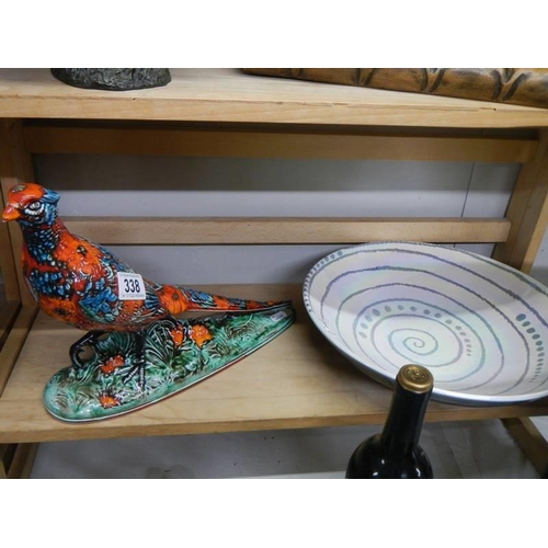 338 - An Anita Harris art pottery pheasant and a spiral art bowl.