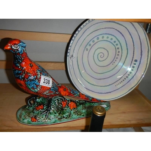 338 - An Anita Harris art pottery pheasant and a spiral art bowl.