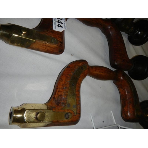 344 - Three antique brass mounted braces.