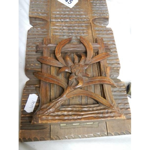 345 - A carved Black Forest style adjustabel book stand.