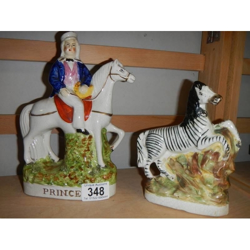 348 - Two 19th century Staffordshire figures being Prince and a Zebra.