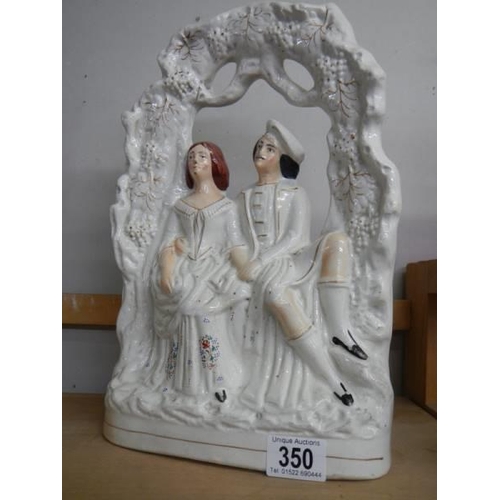 350 - Two 19th century Staffordshire flat back figures.