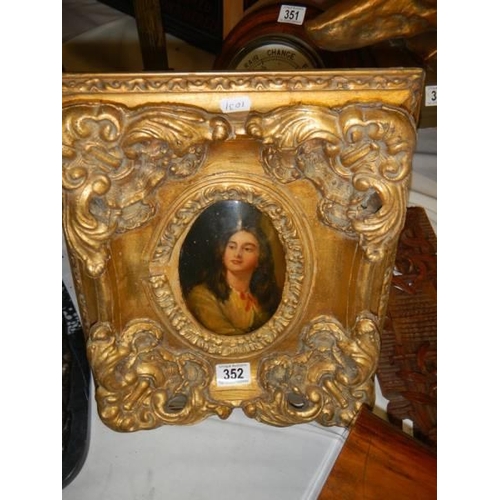 352 - A gilt framed oval portrait of a lady.