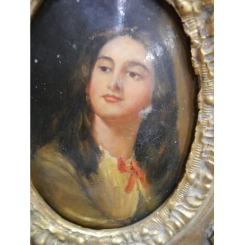 352 - A gilt framed oval portrait of a lady.