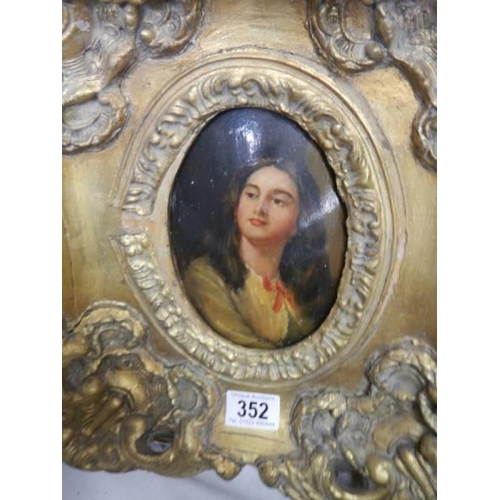 352 - A gilt framed oval portrait of a lady.