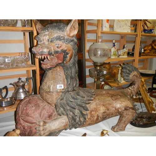 356 - A pair of very large Chinese wooden Dogs of Fo.  a/f.