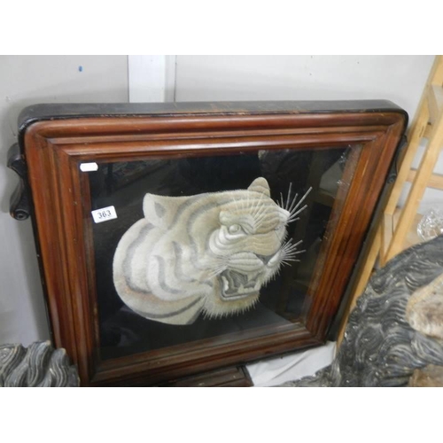 363 - A framed and glazed embroidered tiger head. COLLECT ONLY.