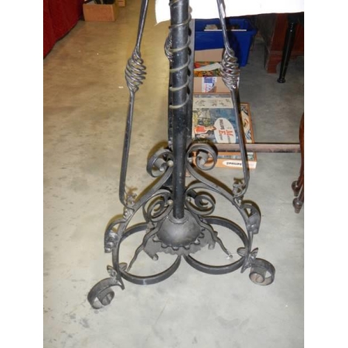 366 - A 19th century wrought iron standard lamp with shade, COLLECT ONLY.