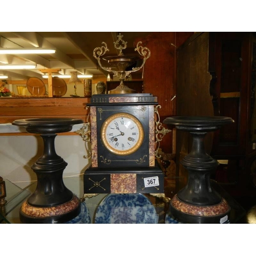 367 - A 19th century three piece clock garniture.