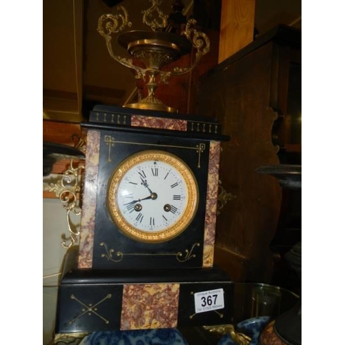 367 - A 19th century three piece clock garniture.