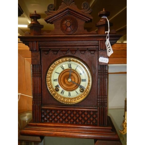 370 - A mahogany eight day mantel clock.