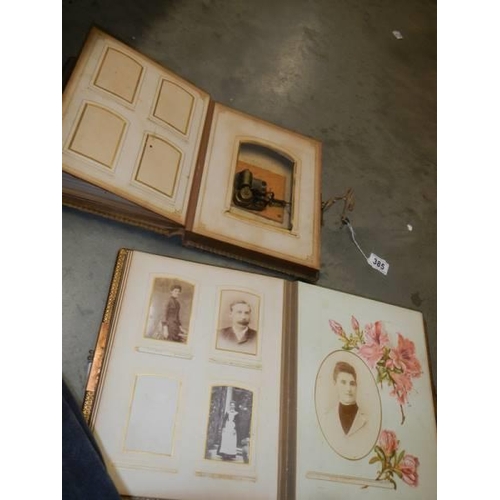 385 - A Victorian musical photo album and another Victorian photo album.