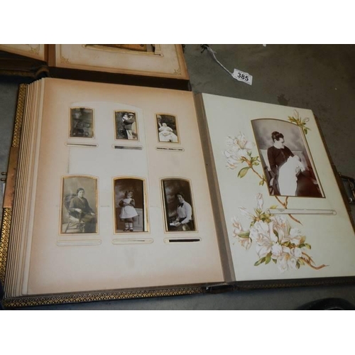 385 - A Victorian musical photo album and another Victorian photo album.